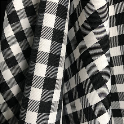 TWILL 300D Filamento de poliéster teñido tejido negro y blanco tela de revestimiento de revestimiento 57/58
